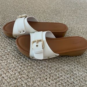 White sandals and buckle